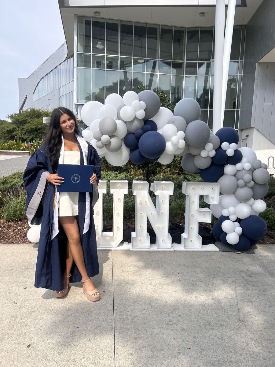 Graduate in her cap and gown