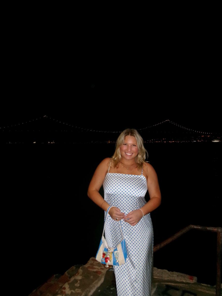 Client in a blue dress at night